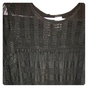 Black and flowy blouse